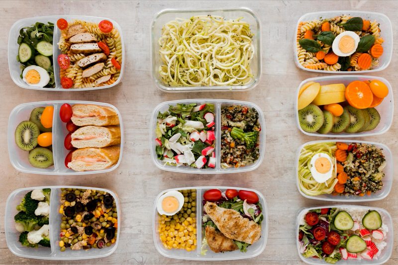 A meal plan setup with 10 containers of food for different upcoming meals.