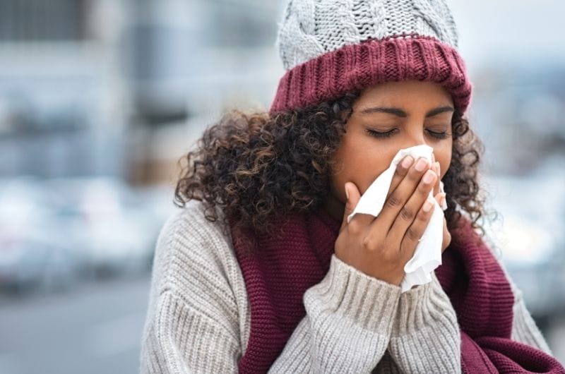 A woman with the cold and flu is noticing a loss of taste