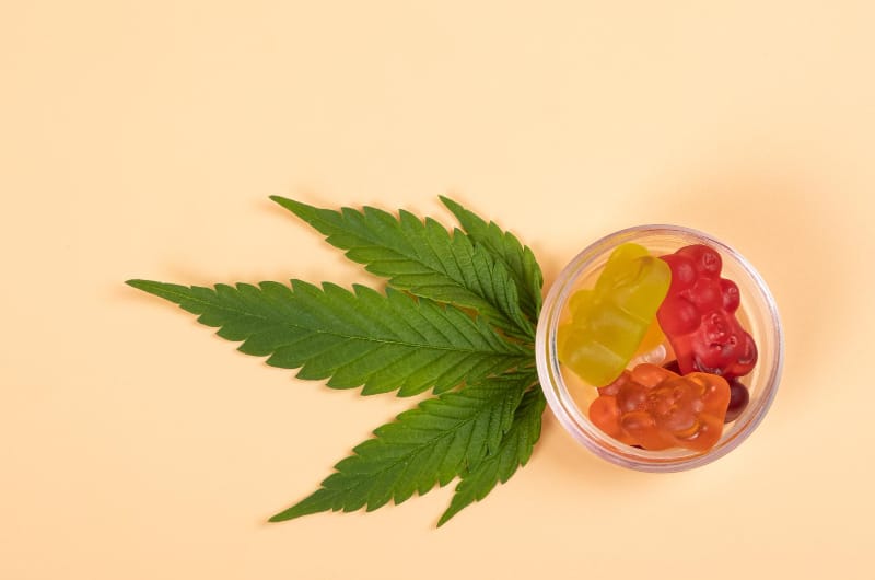 A bowl of edible CBD gummies can be consumed to help a person with their anxiety
