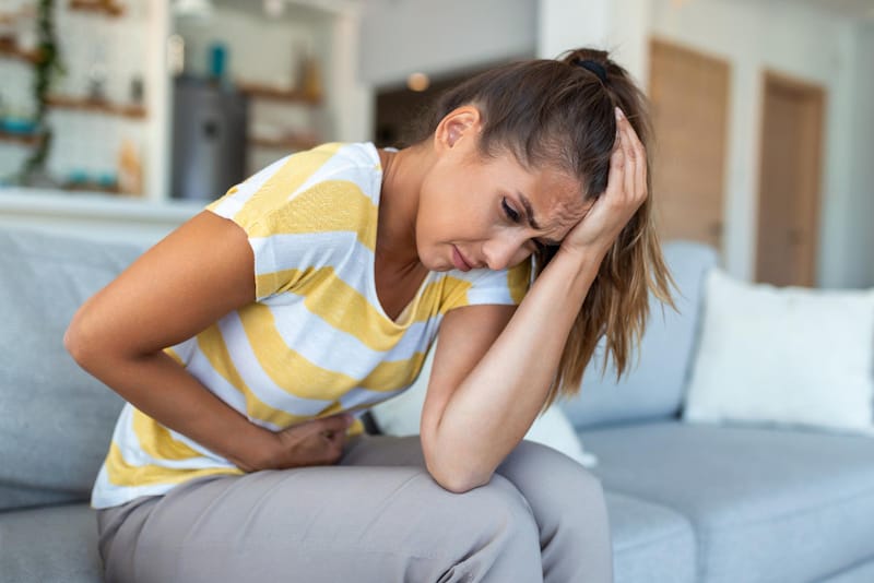 A woman is experiencing abdominal pain during her pregnancy