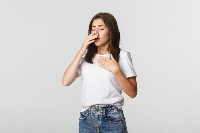 A young woman is constantly sneezing after eating chocolate, and she's wondering if it's an allergy to chocolate or just sensitivity to it.