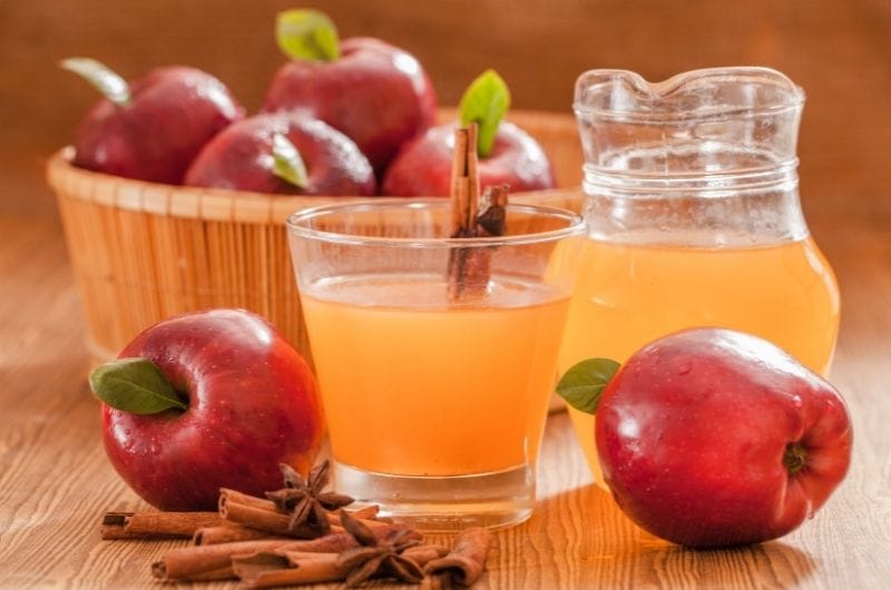 A cup of homemade apple cider vinegar